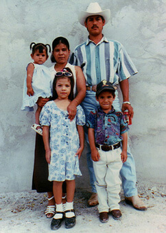 Silvia Perez, her husband Alfredo (who works in an assembly plant owned by Sylvania), and their three children in Ciudad Juárez. Courtesy the Perez family.
