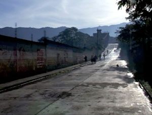 People, road, and wall from Brother Towns, 2010.