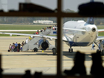 Michael Rieger/FEMA, Hurricane Katrina evacuees board an aircraft for evacuation at New Orleans airport where FEMA had set up operations, New Orleans, Louisiana, September 2, 2005.