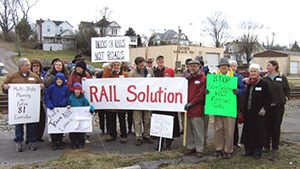 Kathy Shearer, RAIL Solution rally along the I-81 Corridor, Abingdon, Virginia, 2005. Used with permission. RAIL Solution fought I-81 privatization and advocates a "steel interstate system" alongside the road. Kathy Shearer, RAIL Solution rally along the I-81 Corridor, Abingdon, Virginia, 2005. Used with permission. RAIL Solution fought I-81 privatization and advocates a "steel interstate system" alongside the road.