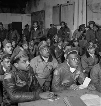 Toni Frissell, Photograph of several Tuskegee airmen attending a briefing in Ramitelli, Italy, March 1945. Courtesy of the Library of Congress. Toni Frissell, Photograph of several Tuskegee airmen attending a briefing in Ramitelli, Italy, March 1945. Courtesy of the Library of Congress.
