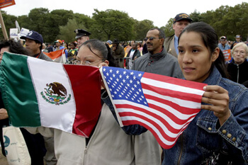 Stan Schnier, Women hold Mexican and American flags at the final Immigrant Workers Freedom Ride event, Flushing Meadows Corona Park, New York, New York, October 4, 2003. Stan Schnier, Women hold Mexican and American flags at the final Immigrant Workers Freedom Ride event, Flushing Meadows Corona Park, New York, New York, October 4, 2003.