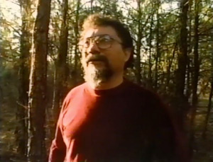 Photograph of Raymond Andrews in the woods, still from Somebody Else, Somewhere Else, 2010. Photograph of Raymond Andrews in the woods, still from Somebody Else, Somewhere Else, 2010.