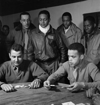 Toni Frissell, Tuskegee airmen playing cards in the officers' club in the evening, Ramitelli, Italy, 1945. Courtesy of the Library of Congress. Toni Frissell, Tuskegee airmen playing cards in the officers' club in the evening, Ramitelli, Italy, 1945. Courtesy of the Library of Congress.
