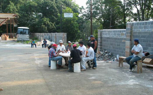 Terry Easton, Passing time waiting for work. Canton, Georgia, August 2003