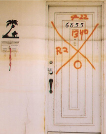 Christina Bray, Successive water lines on door in Lakeview, 2007.