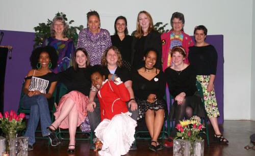 Photographer unknown, Members of Charis's Young Writers group with founder Linda Bryant (back row left), publisher and Charis Circle co-director Kelley Alexander (back row second from left), and writer Merrill Mushroom (back row second from right), Atlanta, Georgia, 2003.