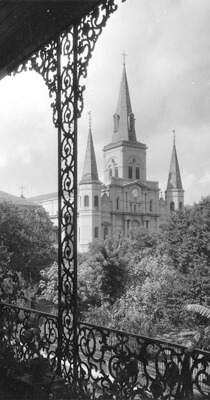 St. Louis Cathedral, Seen from the Pontalba Apartments, from the WPA Guide to New Orleans.