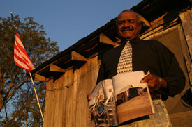 Suli Yi, Seaberry holding a copy of the November 2004 Esquire magazine Japan,  which featured an article about him and the lounge, November 2004.