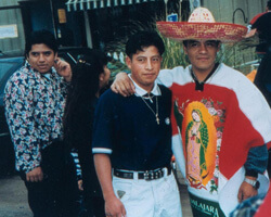 Two men at the Feast Day celebration in honor of Our Lady of Guadalupe, Misión Católica. Doraville, Georgia. Photo by Mary Odem, 2000