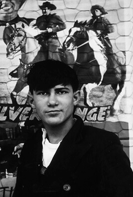Todd Webb, J. C. Boudreaux in front of a theatre poster, c. 1947. Courtesy of Standard Oil of New Jersey Collection, Special Collections, University of Louisville.