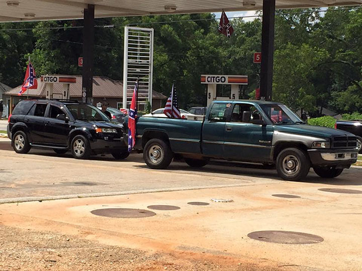 Mark Auslander, Confederate flag ralliers at gas station, Monroe, Georgia, 2015.