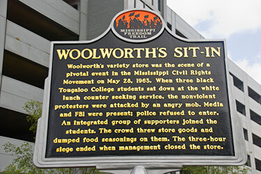 Woolworth's Sit-In Historic marker, a plaque in downtown Jackson, Mississippi, dedicated May 28, 2013. Photograph by Ron Cogswell. Courtesy of Ron Cogswell. CC BY 2.0 Woolworth's Sit-In Historic marker, a plaque in downtown Jackson, Mississippi, dedicated May 28, 2013. Photograph by Ron Cogswell. Courtesy of Ron Cogswell. CC BY 2.0