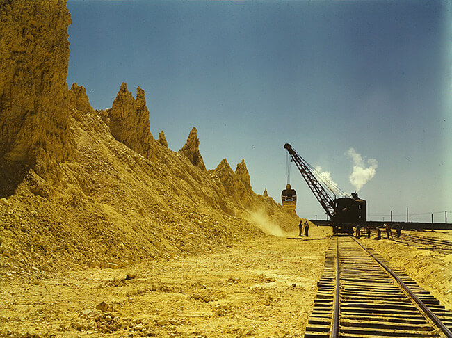 John Vachon, Nearly exhausted sulphur vat from which railroad cars are loaded, Freeport Sulphur Co., Hoskins Mound, Texas, 1943. John Vachon, Nearly exhausted sulphur vat from which railroad cars are loaded, Freeport Sulphur Co., Hoskins Mound, Texas, 1943.