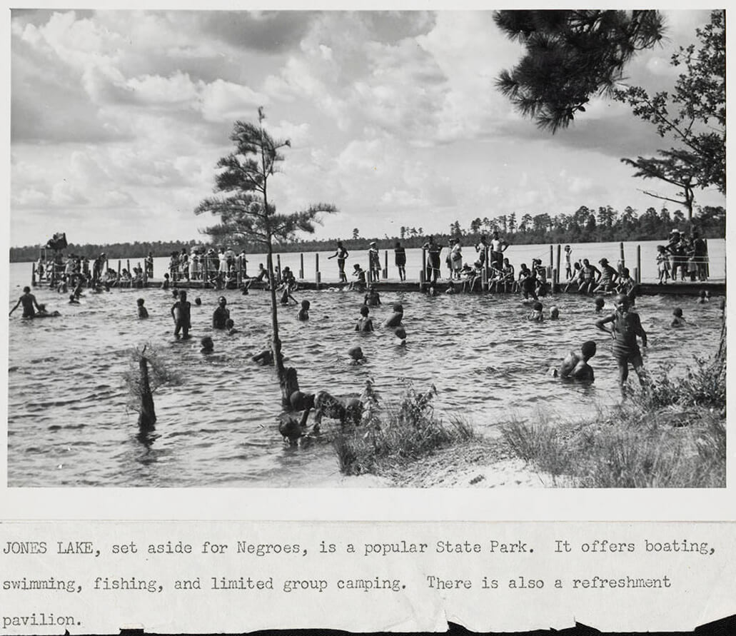 Jones Lake State Park, Bladen County, North Carolina, ca. 1940. Photograph by unknown creator, North Carolina Division of Parks and Recreation. Courtesy of the North Carolina Division of Parks and Recreation Records collection, State Archives of North Carolina, North Carolina Digital Collections, State Library of North Carolina. Jones Lake State Park, Bladen County, North Carolina, ca. 1940. Photograph by unknown creator, North Carolina Division of Parks and Recreation. Courtesy of the North Carolina Division of Parks and Recreation Records collection, State Archives of North Carolina, North Carolina Digital Collections, State Library of North Carolina.