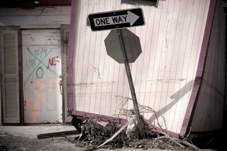 Lower Ninth Ward, New Orleans, Louisiana, November 2005. Photograph by Jane Fulton Alt. Originally published in Jane Fulton Alt’s Look and Leave: Photographs and Stories from New Orleans’s Lower Ninth Ward (Center for American Places at Columbia College Chicago, 2009). Two sets of codes indicating that a second search took place at this location. The second occurred after the flooding had receded since the code is applied below the water line remaining on the building. © Jane Fulton Alt. Lower Ninth Ward, New Orleans, Louisiana, November 2005. Photograph by Jane Fulton Alt. Originally published in Jane Fulton Alt’s Look and Leave: Photographs and Stories from New Orleans’s Lower Ninth Ward (Center for American Places at Columbia College Chicago, 2009). Two sets of codes indicating that a second search took place at this location. The second occurred after the flooding had receded since the code is applied below the water line remaining on the building. © Jane Fulton Alt.