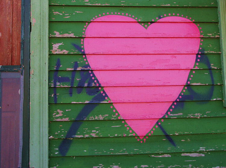 Faubourg St. John, New Orleans, Louisiana, 2005. Photograph by Cynthia Scott. A heart almost obliterates an offending X on Maurepas Street. © Cynthia Scott. Faubourg St. John, New Orleans, Louisiana, 2005. Photograph by Cynthia Scott. A heart almost obliterates an offending X on Maurepas Street. © Cynthia Scott.