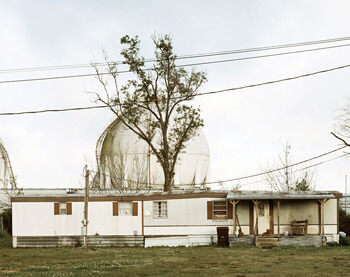 Trailer Home and Natural Gas Tanks, Good Hope Street, Norco, Louisiana, 1998. Photograph by Richard Misrach. Courtesy of Pace/MacGill Gallery, New York; Fraenkel Gallery, San Francisco; and Marc Selwyn. © Richard Misrach.