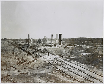 Aftermath of September 2, 1864, Confederate destruction of ammunition-laden railcars, near present-day Fulton Cotton Mill lofts, Atlanta, Georgia. Gelatin silver print by George Barnard. Courtesy of Library of Congress. Aftermath of September 2, 1864, Confederate destruction of ammunition-laden railcars, near present-day Fulton Cotton Mill lofts, Atlanta, Georgia. Gelatin silver print by George Barnard. Courtesy of Library of Congress.