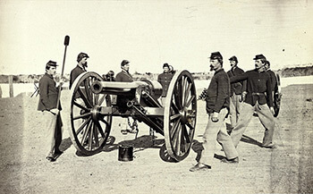 A twenty-pound Parrott Gun and its crew at Fort Richardson, Arlington Heights, Virginia, 1861–1865. The De Gress Battery was comprised of four rifled cannon of this type. Albumen print, ca. 1865. A twenty-pound Parrott Gun and its crew at Fort Richardson, Arlington Heights, Virginia, 1861–1865. The De Gress Battery was comprised of four rifled cannon of this type. Albumen print, ca. 1865.