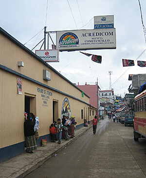 Family members collect remittances, Comitancillo, Guatemala, 2006. Photograph by Angela Stuesse. Courtesy of Angela Stuesse.