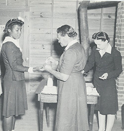 Women receive health services, Emory University Field Station on Ichuaway Plantation, ca. 1938-1945. United States Public Health Services Office of Malaria Control in War Areas, Melvin H. Goodwin papers, Manuscript, Archives and Rare Books Library, Emory University.